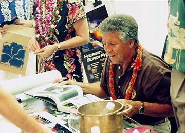 Mario signing autographs